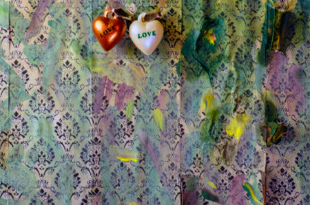 A closeup shot of a decorative heart on a textured background