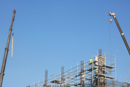 building worker and crane