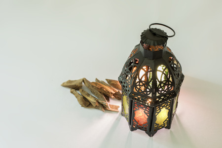 Oriental Colored Lantern and Agar wood - Oud - in Arabic, stand on a Satin clothの写真素材