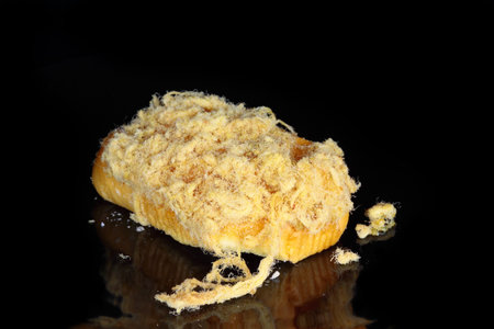 Bread with shredded pork on black background