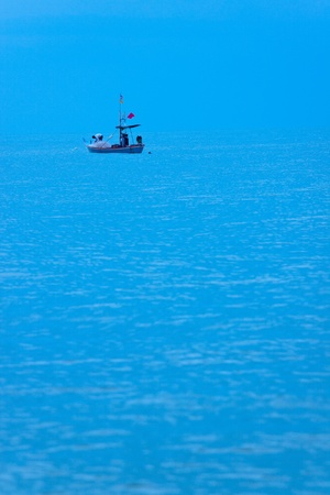 Thai fisherman net to catch fish in the early morningの写真素材