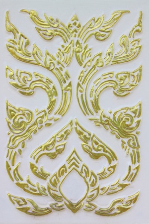 Thai design on cement surfaceの写真素材