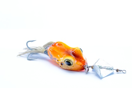 Yellow frog bait and aluminium turbineの写真素材