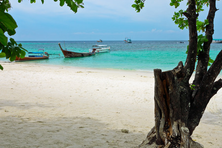 White sand,turquoise color and cool under the shade of Lipe,Thailandの写真素材