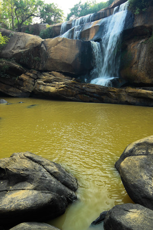 TadHuang waterfall,the waterfall on the border between Thailand and Laoの写真素材