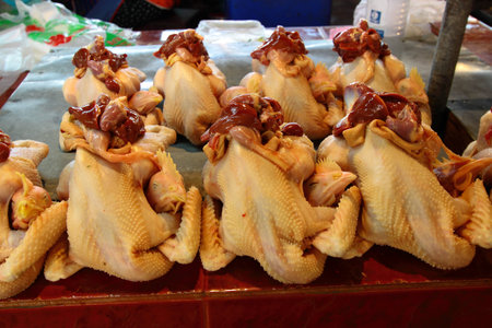 Chicken on prepare status for food in local marketの写真素材