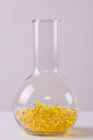 yellow capsule medical vitro, picture with depth of field, macroの写真素材