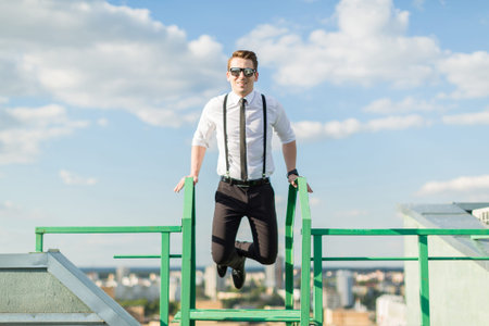 A handsome man in a suit and sunglasses