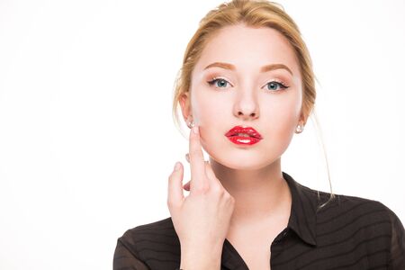 Girl in a black shirt with makeup on a  backgroundの写真素材