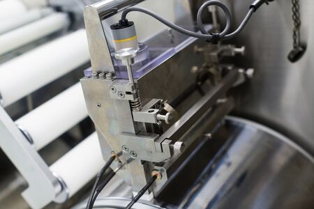 steel electronic part of machine, shafts on backgroundのeditorial素材