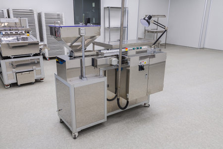 photos sterile production area with stainless steel machine for the production and sorting of pills...