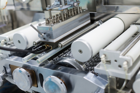close look of part with shafts in manufacture machineの写真素材