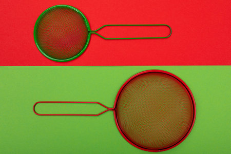 Composition of kitchen utensils for cooking isolated on colorful background
