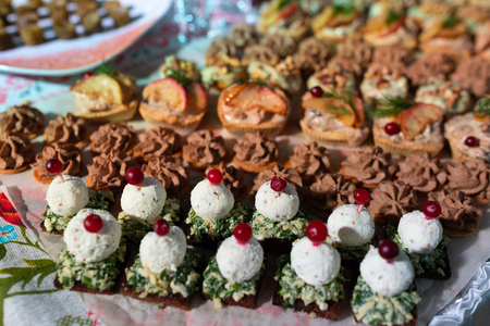 close-up of a variety of snacks are on the table in the restaurant. bright mouth-watering food. Delicacies and snacks in the buffet. A gala reception. Banquet. Cateringの写真素材