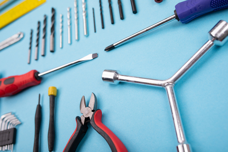 Set of different tools on background are spread out in a rowの写真素材