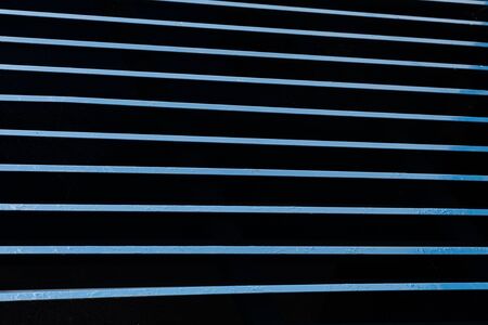 Dark, black and blue lines on wall surface