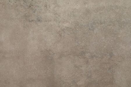 A smooth grey concrete wall