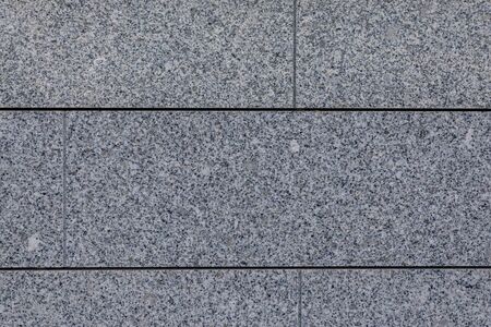 Top view of grey granite tile surfaceの写真素材