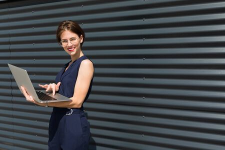 young beautiful businesswoman with laptop.