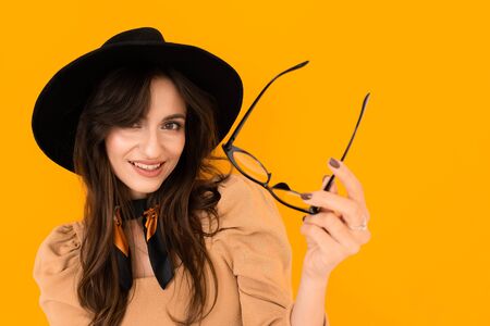 A young beautiful woman with long wavy chestnut hairの写真素材