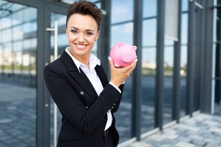 stylish business woman at work, concept of a strong and confident womanの写真素材