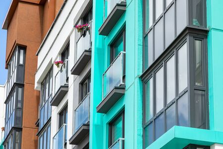 Close-up of balconies with flowers of apartment buildingの写真素材
