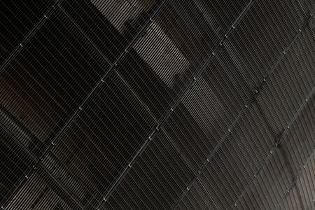 Bottom view of black metal mesh - transfer grill - inside building