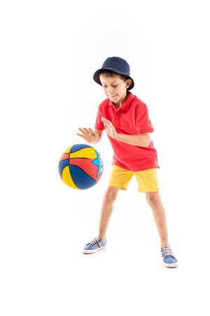 Caucasian teenager boy play basketball, picture isolated on white background.の写真素材