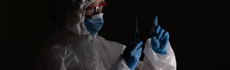 Scientist with a vaccine against the coronavirus pandemic