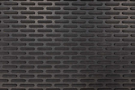 black rubber floor mat close-up.の写真素材