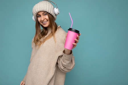 Photo of sexy attractive young happy smiling blonde woman wearing everyday stylish clothes isolated...