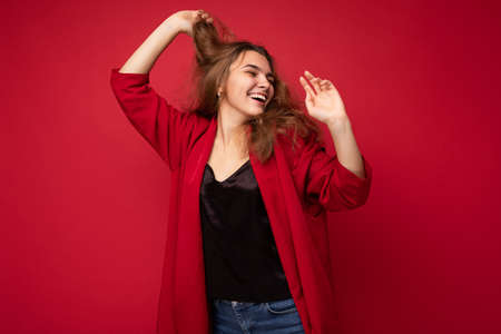 Photo of young attractive caucasian hipster woman in trendy casual clothes. Sexy carefree female...