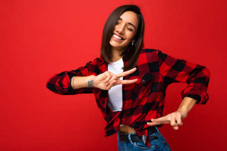 Young happy positive adorable winsome smiling nice cool beautiful brunette woman with sincere...