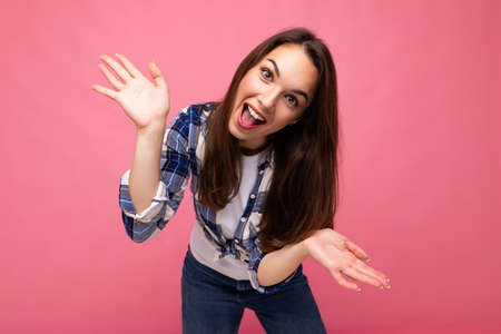 Photo of young positive happy smiling beautiful woman with sincere emotions wearing stylish clothes...
