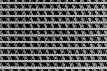 Car radiator background. Engine cooler background. Vintage style.Grid radiator air conditioning,...