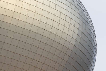 aluminum sphere on sky background, abstract background