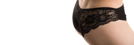 slim female body on a white background, panties, half-length shotの写真素材