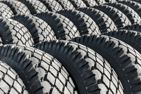 Photo of black big tires on wheels for large cars