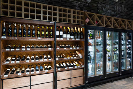Minsk, Belarus - Nov 25, 2021: Photo of the wine and spirits department in a grocery store with...