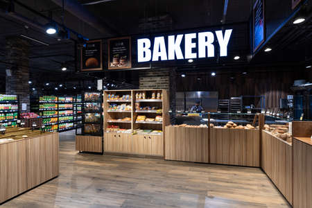 Minsk, Belarus - Nov 25, 2021: Photo of the pastry and cakes department in a grocery store with food. Shop and shopping concept. Bakeryのeditorial素材
