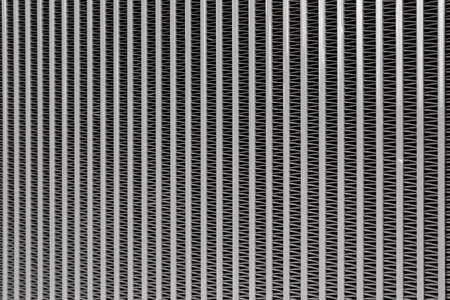 Car radiator background. Engine cooler background. Vintage style.Grid radiator air conditioning, close-up abstract photo shotの写真素材