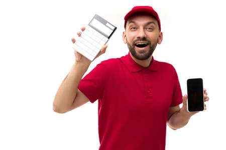 courier in orange polo and cap shows smartphone screen