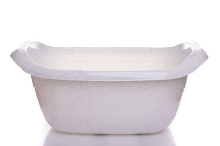 empty white wash basin on white background, plastic tableware concept