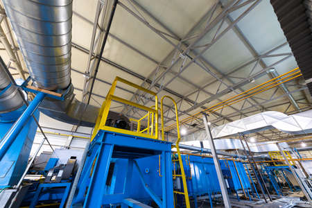 Photo shot of rolls of steel sheet stored in warehouse; Cold rolled steel coils at the factory....