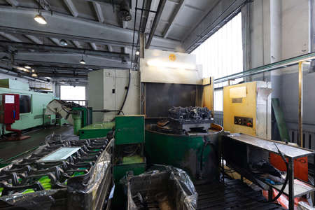 Modern automobile manufacturing plant. Factory with steel constructions. Industrial scenery...