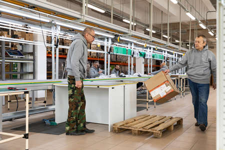Minsk, Belarus - Dec 15, 2021: Photo of a large plant inside for assembling monoblocks for...