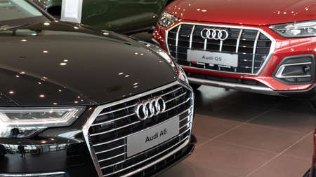 Minsk, Belarus - Dec 20, 2021: Dealership showroom Premium Audi cars with Q5 and Audi A6 sedans in...