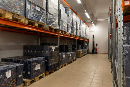 Minsk, Belarus - Jan 05, 2022: Photo of a warehouse with large boxes on the shelves. Factory