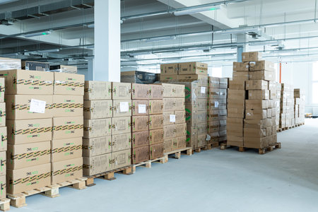 Minsk, Belarus - Jan 05, 2022: Photo shot of a warehouse with boxes on the shelves. Utility room of a plant or factory. Productsのeditorial素材