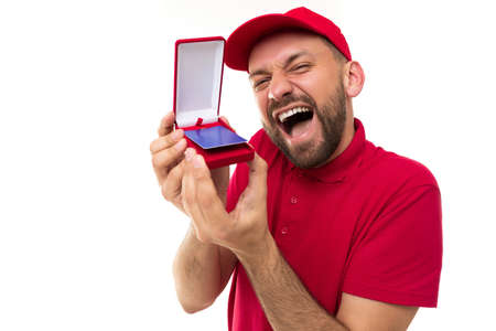 emotional charismatic delivery service couriers and holding a discount gift cardの写真素材